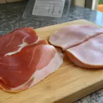 Cotto o crudo: il numero sui nitrati che cambia come scegli il prosciutto